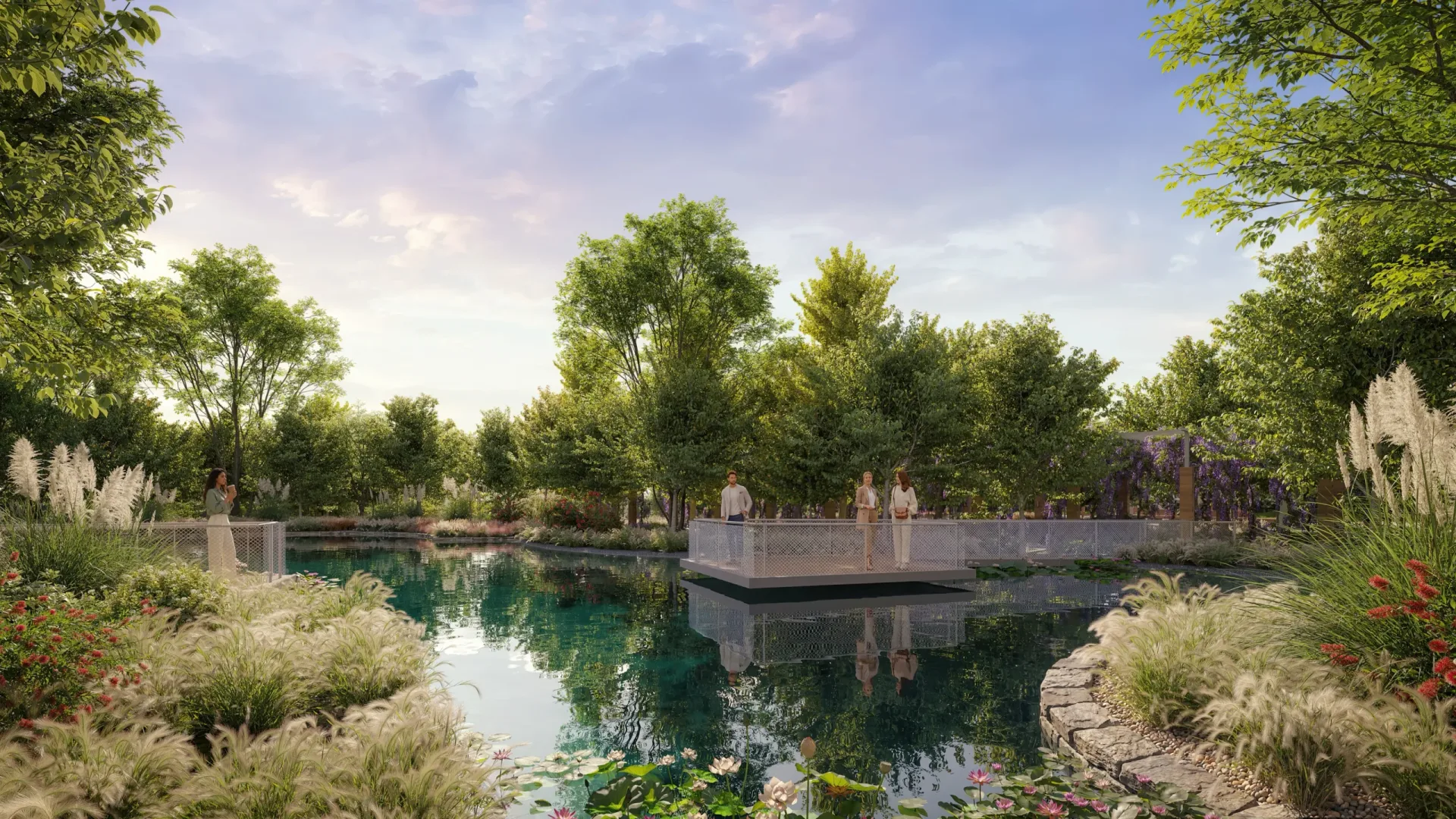 Pond, bridge and landscaped grounds at sunset